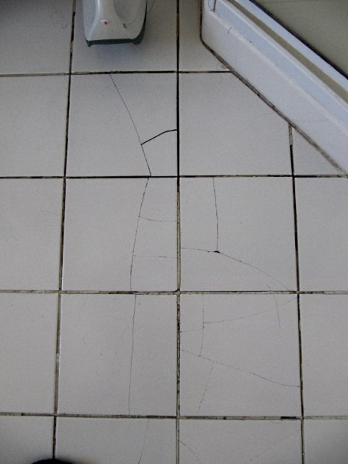 broken loose tiles